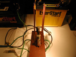 etching fixture showing anode clamps and cathode plates
