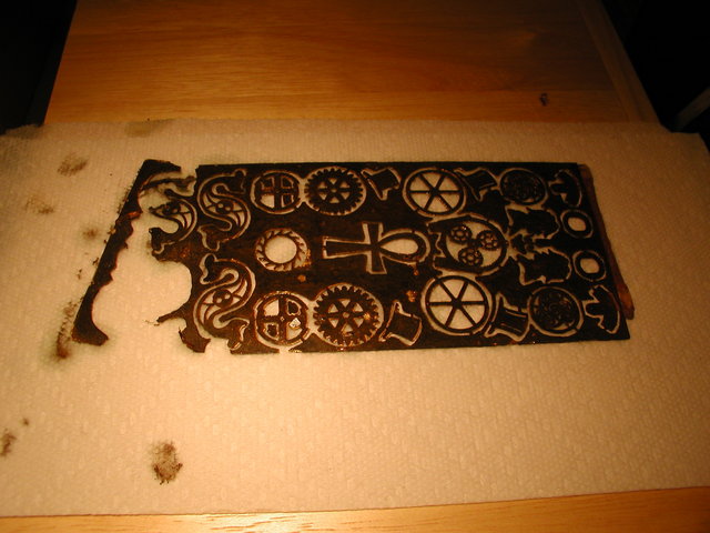 steampunk charms etched from brass