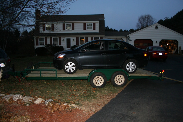 towing yaris on a trailer