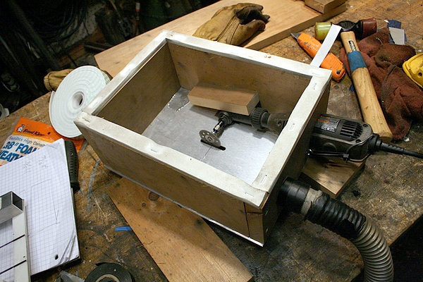 So I built myself a little Dremel powered table saw and “sled 