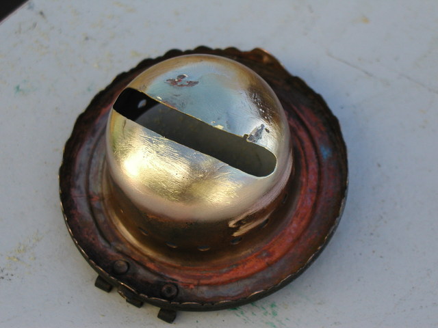 burner shell with flame slot re-cut