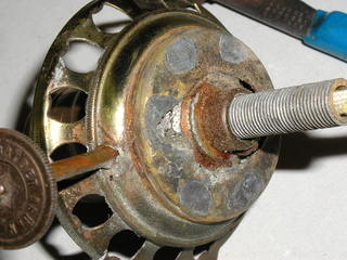 back side of damaged burner