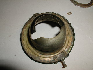burner shell with hole for light socket
