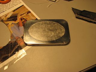 altoids tin with tape mask