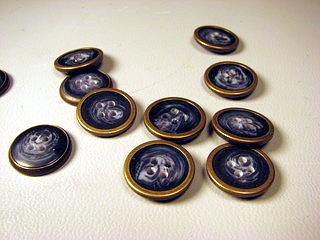 brass rimmed buttons