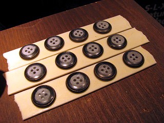 sanding button backs